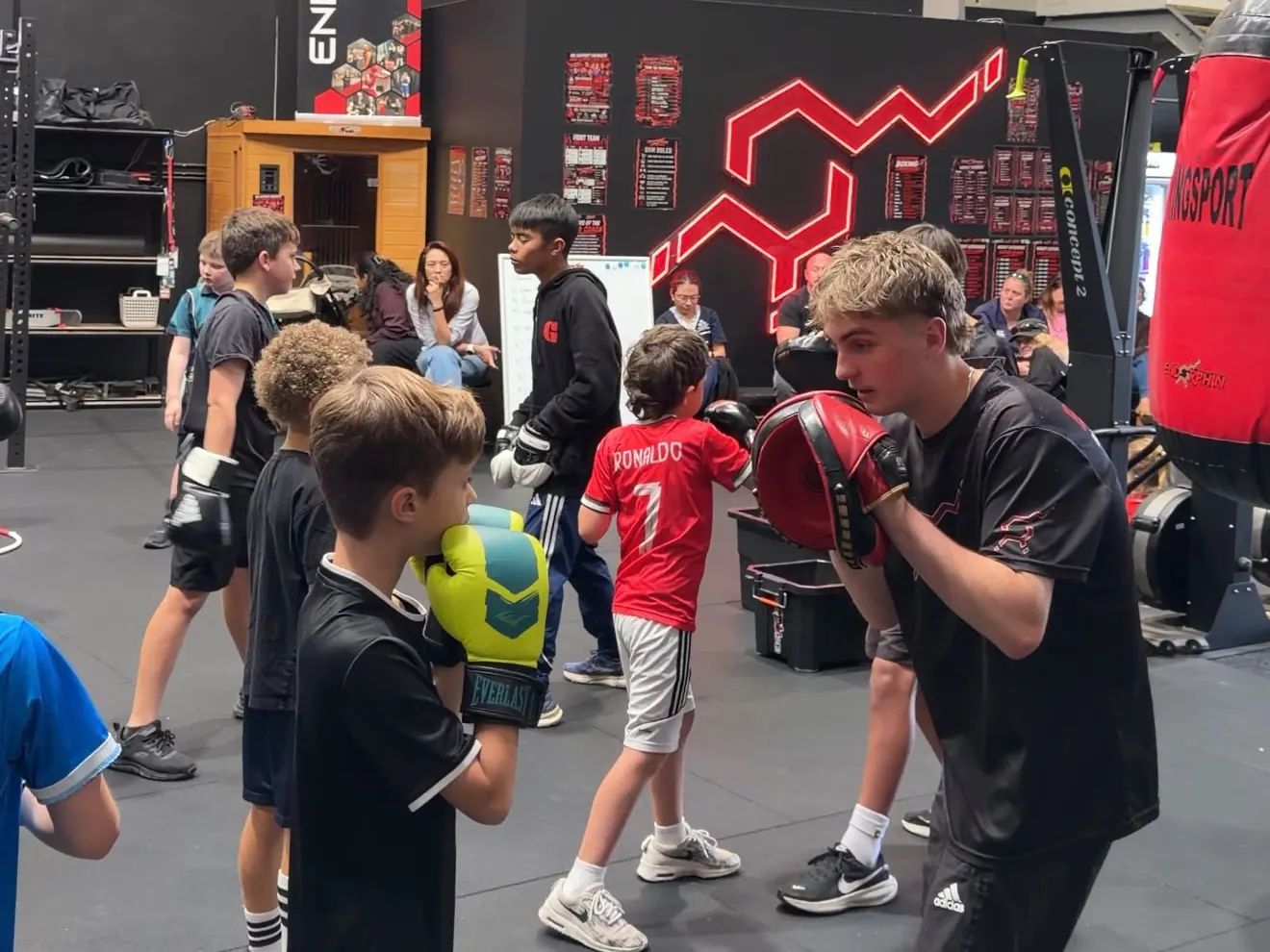 Junior boxers on pads
